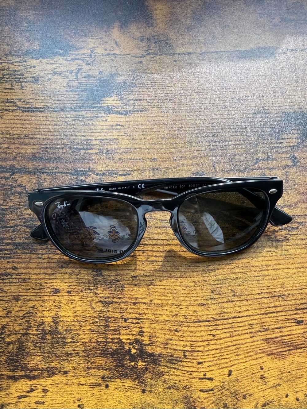 Ray-Ban Black Frame Sunglasses with Dark Lenses